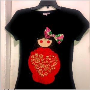 Kids vintage T shirt with a cute bow patch